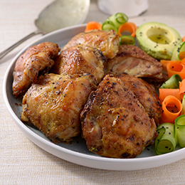 Lemon and Garlic Oven Baked Chicken Thighs served with Cucumber and Carrot Ribbons